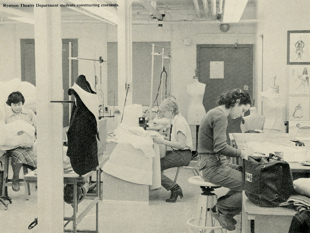 A blanck and white photos of students working in a costume shop